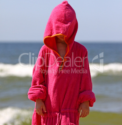 Child by the sea