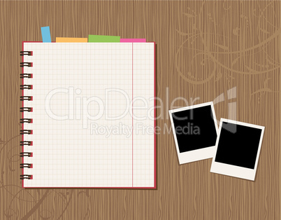 Notebook page design and photos on wooden background