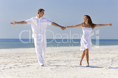 Happy Romantic Couple Dancing Holding Hands on A Tropical Beach