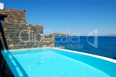 Swimming pool by luxury villa, Crete, Greece