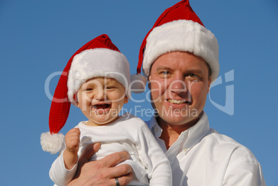 Weihnachtsfoto - Vater mit lustigem Sohn -