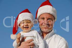 Weihnachtsfoto - Vater mit lustigem Sohn -
