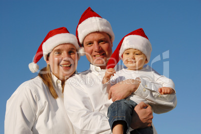 Weihnachtsfamilienfoto mit Kleinkind