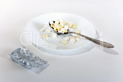 Tablets in a  spoonful