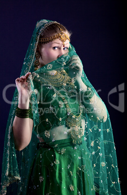 young woman look at you - close face with veil