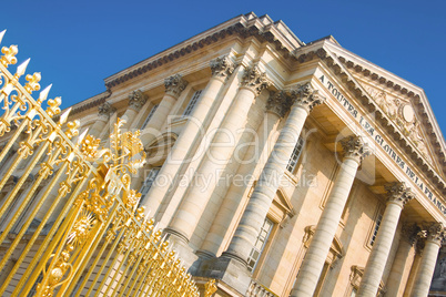 Palace facade and golden gate in Versailles