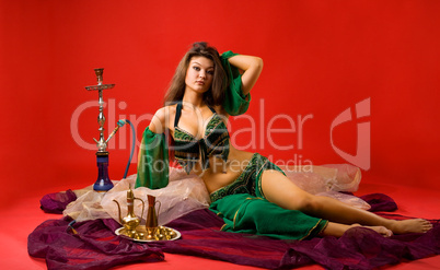 beauty young woman with hookah on veil