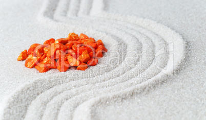 Orange Stones on fine Sand - Wellness Concept