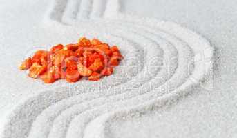 Orange Stones on fine Sand - Wellness Concept