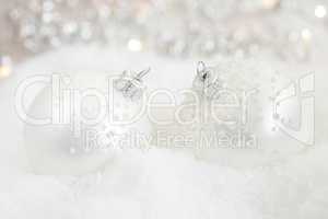 Christmas baubles in snow