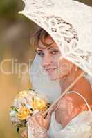 Bride with umbrella