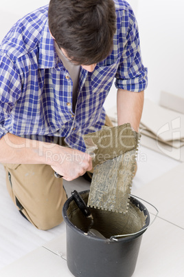 Home improvement - handyman laying tile