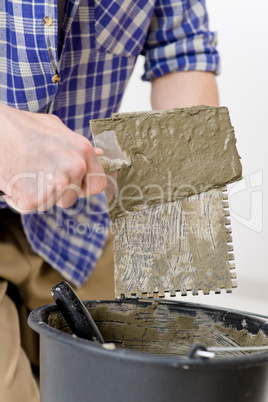 Home improvement - handyman laying tile