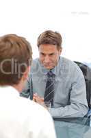 Charismatic manager during an interview with an employee