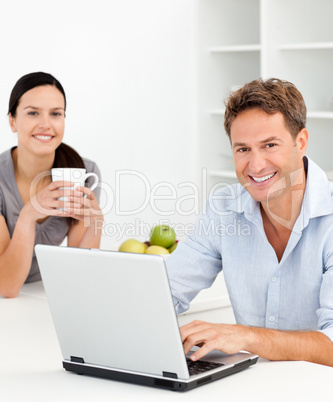 Portrait of a couple relaxing together in the kitchen