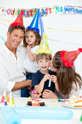 Portrait of a happy family during a birthday party