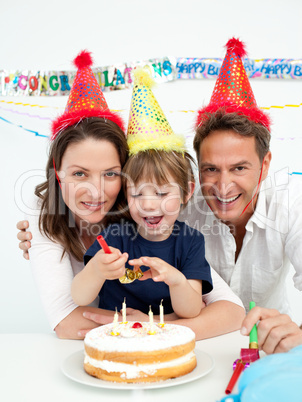 Little boy celebrating his birthday at home