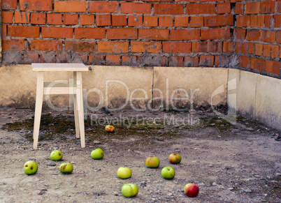 apples scattered on the floor
