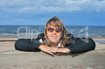 Woman relaxing at the sea.