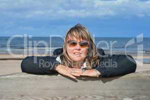 Woman relaxing at the sea.