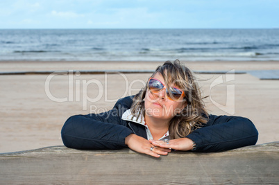 Woman relaxing at the sea.