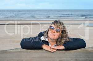 Woman relaxing at the sea.