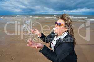 Adult woman at the sea