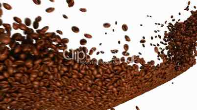 Coffee beans flow with slow motion over white