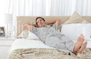 Tranquil man lying on his bed