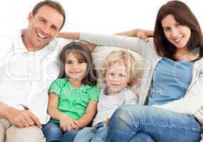 Portrait of a family on the sofa