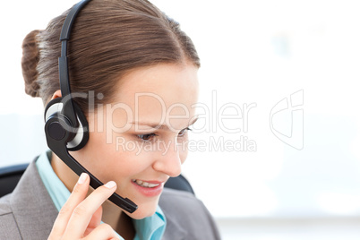 Female operator on the phone with earpiece