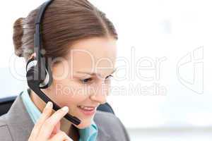 Female operator on the phone with earpiece