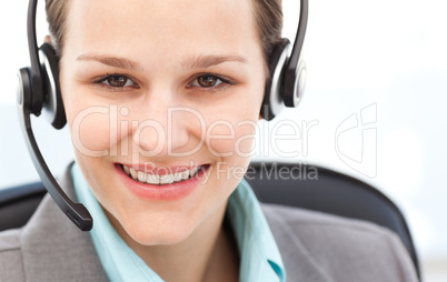 Portrait of a pretty operator with earpiece