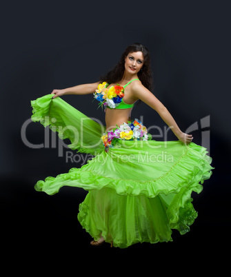 Beauty mature woman dance in green costume
