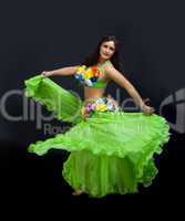 Beauty mature woman dance in green costume