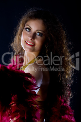 Beauty mature woman with red boa look at you