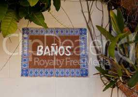 Banos sign in tiles
