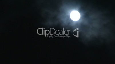 Timelapse eerie full moon with clouds