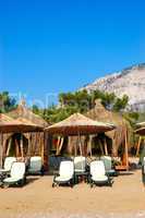 Sunbeds at the beach of luxury hotel, Antalya, Turkey