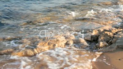shallow of sea on sand beach, stones