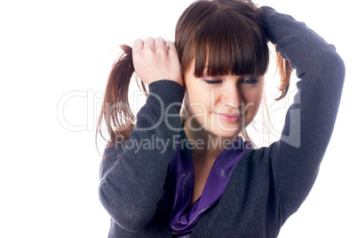 Woman with hands in hair