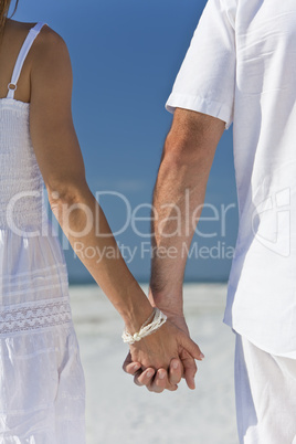 Couple Holding Hands on An Empty Beach