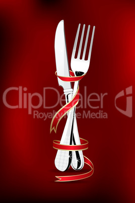 spoon and fork wrapped in ribbon