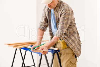 Home improvement - handyman prepare wooden floor