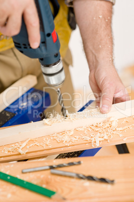 Home improvement - handyman drilling wood