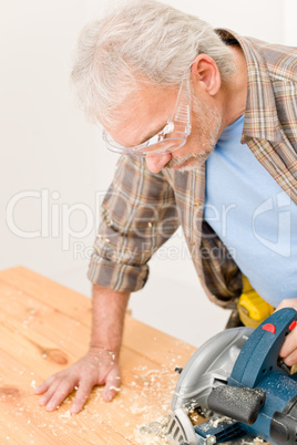 Home improvement - handyman cut wood with jigsaw