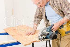Home improvement - handyman cut wood with jigsaw