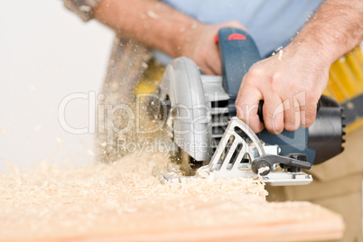 Home improvement - handyman cut wood with jigsaw