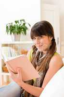 Teenager girl relax home - read book