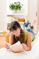 Teenager girl relax home - read book